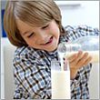 Child Spilling Milk